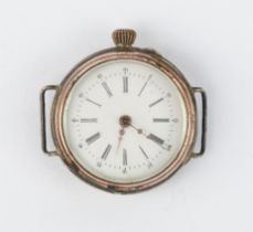 Kleine Taschenuhr, zur Armbanduhr umgearbeitet, rückseitige Schale guillochiert in Silber 800, Rest
