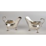 Pair of saucers, silver, mark, Dutch import tax mark, rococo decoration, vessels with wide spouts, 