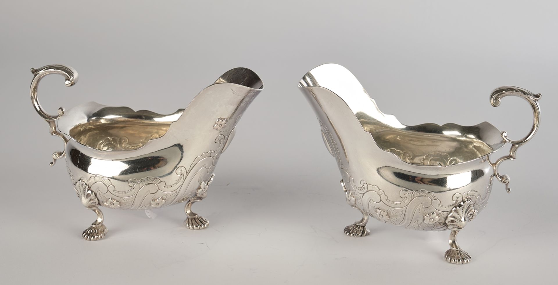 Pair of saucers, silver, mark, Dutch import tax mark, rococo decoration, vessels with wide spouts, 