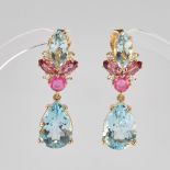 Pair of stud earrings, GG 750, 2 topaz drops totalling ca. 9.42 ct, 2 aquamarine navettes totalling