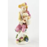 Porcelain figure, , "Harlequin with bagpipes", Meissen, sword mark, 18th century, polychrome and go