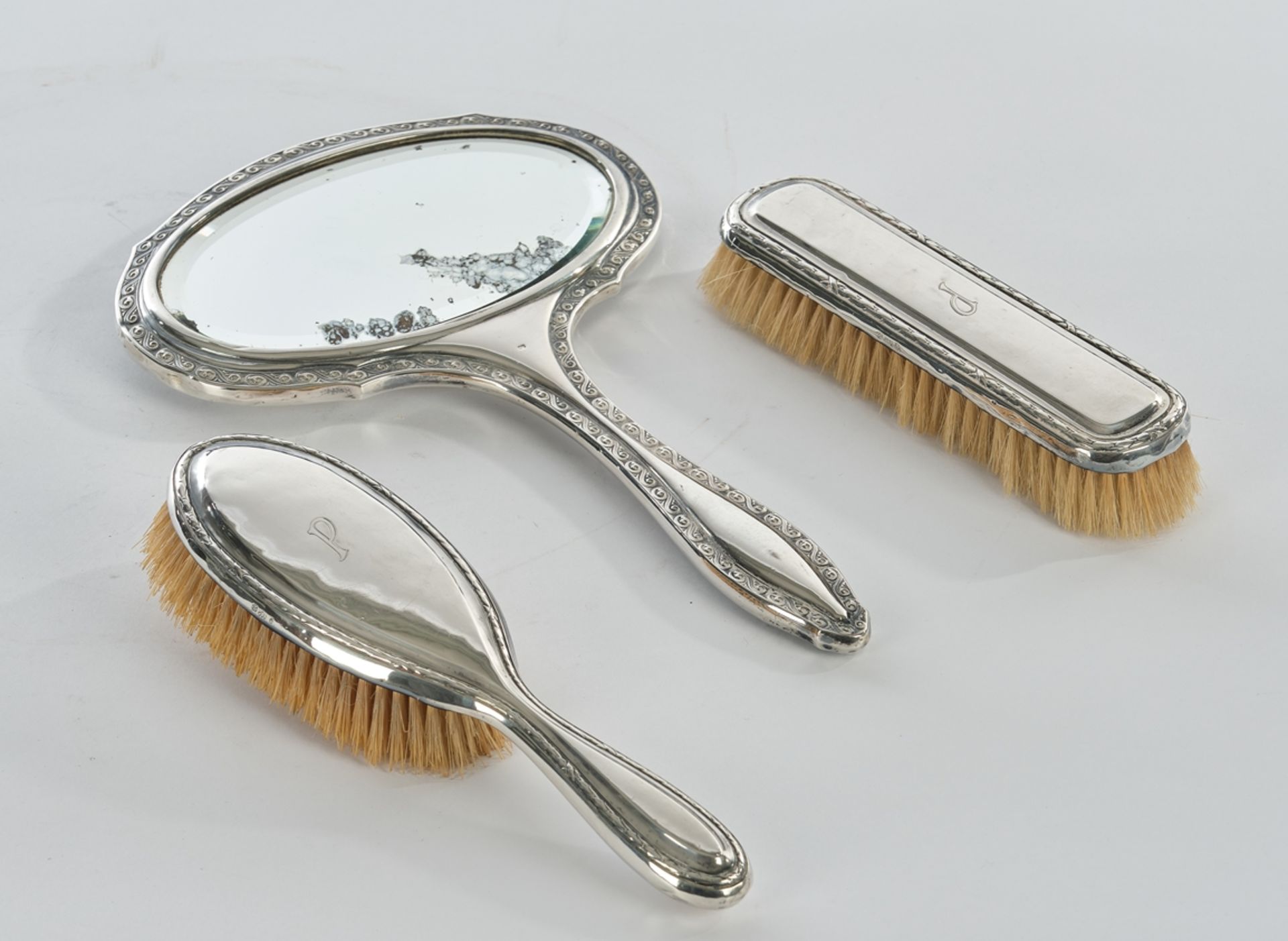 Hand mirror,, 2 brushes, silver 800, various edging borders, each engraved monogram P, 17-28.5 cm h