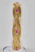 Armband, GG 750, 5 Rubine zus. ca. 2.00 ct., ca. 38.1 g