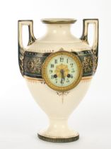 Vase clock, c. 1880, fine stoneware, polychrome and gold painted, vase shape with two handles, crea