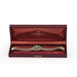 Armband, WG 750, 2x 14 Smaragde, 1 Brillant ca. 0.05 ct., 17 cm lang, ca. 55.5 g