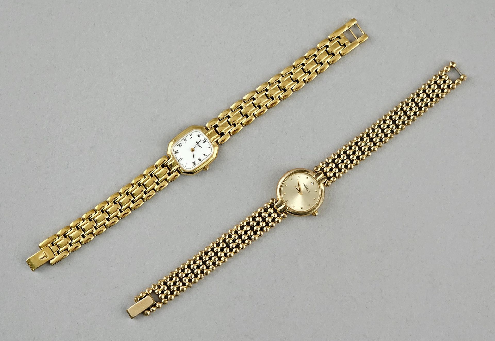 2 vergoldete Damen-Armbanduhren Herbelin und Tissot