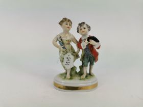 PORCELAIN FIGURINE GROUP "GARDENER'S CHILDREN"