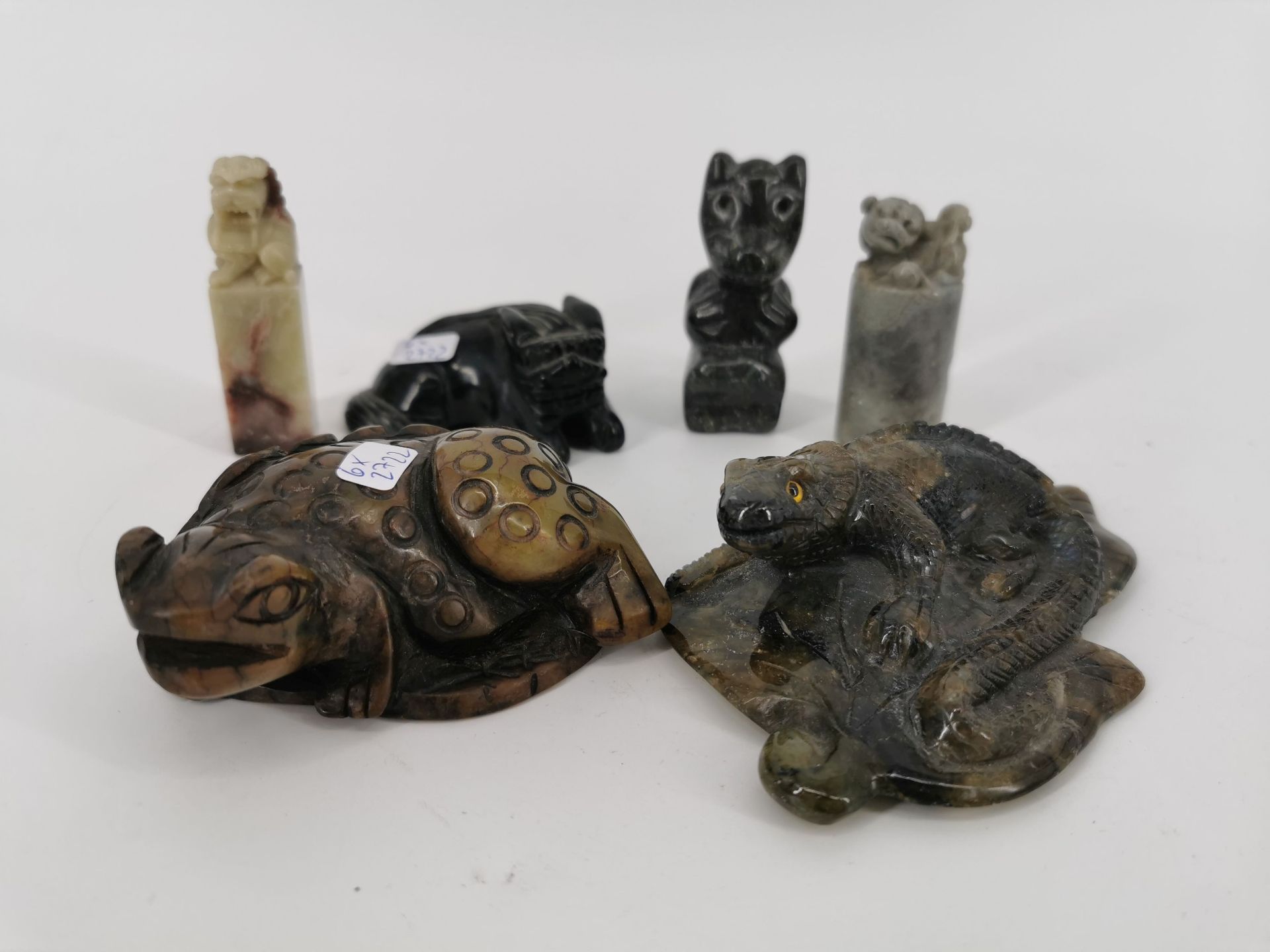 COLLECTION OF CARVED STONE FIGURES 