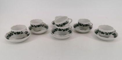 7 DEMITASSE CUPS AND SAUCERS 