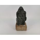 SCULPTURE: SQUATTING WOMAN