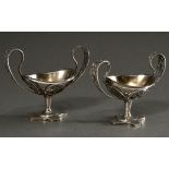 A pair of Empire salvers with filigree bowl and ear handles over a quatrefoil foot, removable inser