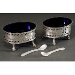 A pair of oval English salt cellars with blue glass inserts and pierced walls and mother-of-pearl s