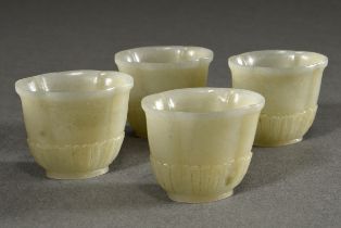 4 Quatrefoil jade bowls with petal relief on stand, China, h. 3.7cm