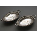 A pair of late Biedermeier top bowls in oval form with engraved ornamental decoration and sculpted 