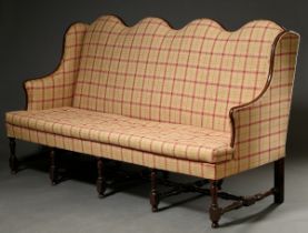 Impressive William and Mary four-seater sofa with multi-legged lathed cleat frame, elegant armrests