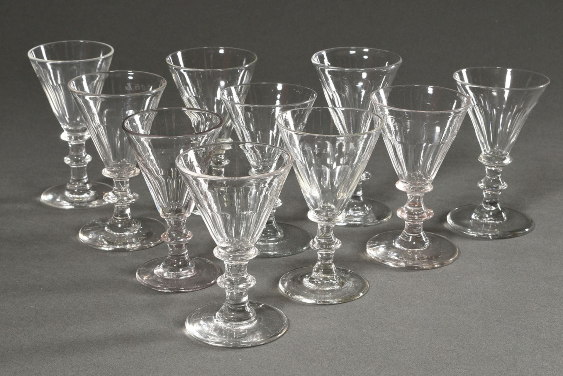 10 Sherry glasses with half surface cut on funnel domes over round foot with nodus in the stem, 1x 