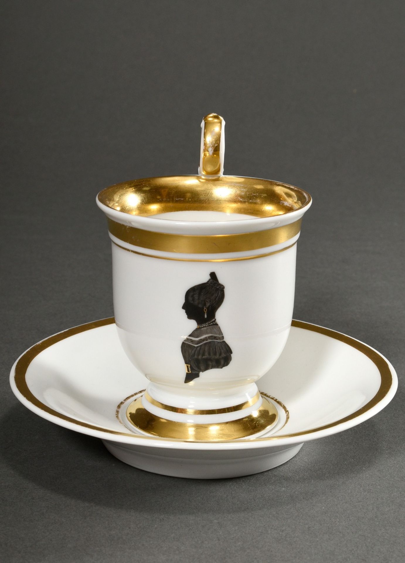 Biedermeier KPM commemorative cup/ saucer with fine black stain silhouette ""Lady with pinned hairs