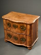 Small rare baroque children's chest of drawers with curved front on pressed ball feet, 2 drawers wi