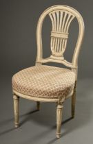 Low fireplace chair in classicist style with carved frame, painted white, around 1800, h. 40/84cm