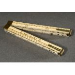 Folding bone ruler with 3 brass joints, sides with length measurements for "Rheinland", "Hamburg" a