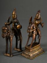 2 Diverse Gelbguss Figuren "Shiva zu Pferde" ausgestattet mit Schild und Schwert, Reiter und Pferd