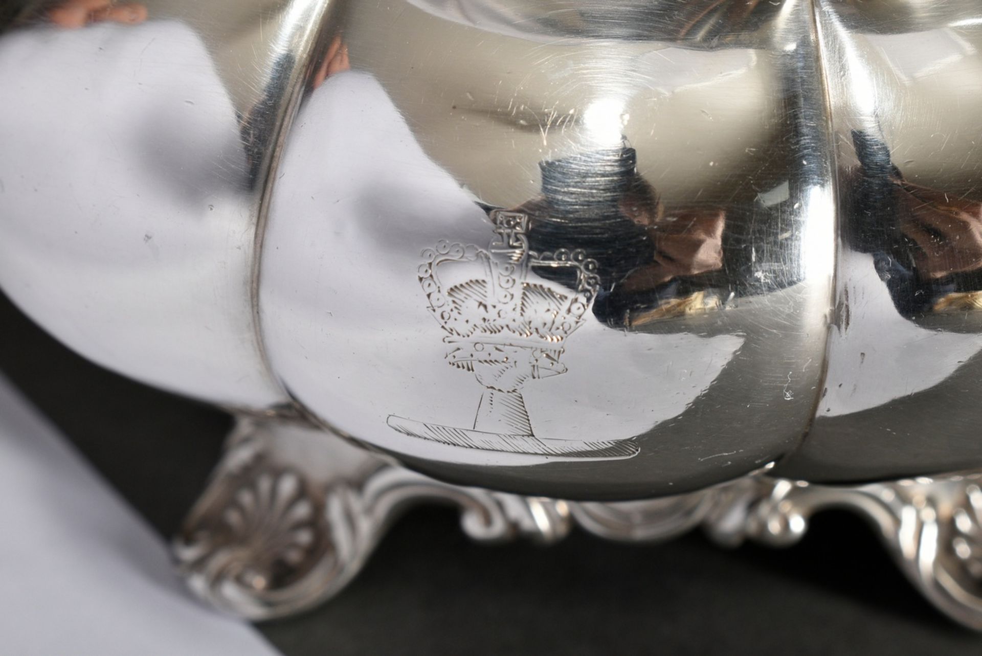 Cambered milk pourer with floral relief rim and feet, engraved family crest "Hand with closed crown - Image 3 of 7