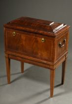 Biedermeier wine cooler on pointed legs, mahogany veneered with band marquetry on softwood, 73,5x58