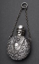 Small English perfume bottle with ornamental body and "angel heads" as well as hanging device, MM: 