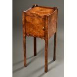 Delicate burl wood bedside cabinet in antique style with one-door compartment on high legs, England