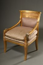Vergoldeter Sessel im Empire Stil mit plastischen Widderköpfen und halbplastischen Sternen in den L