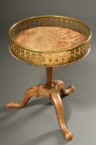 English wine table with round top and brass gallery rim on baluster column over three curved feet, 