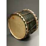 Large military bass drum with green coloured case, rope bracket and black/white coloured tension ri