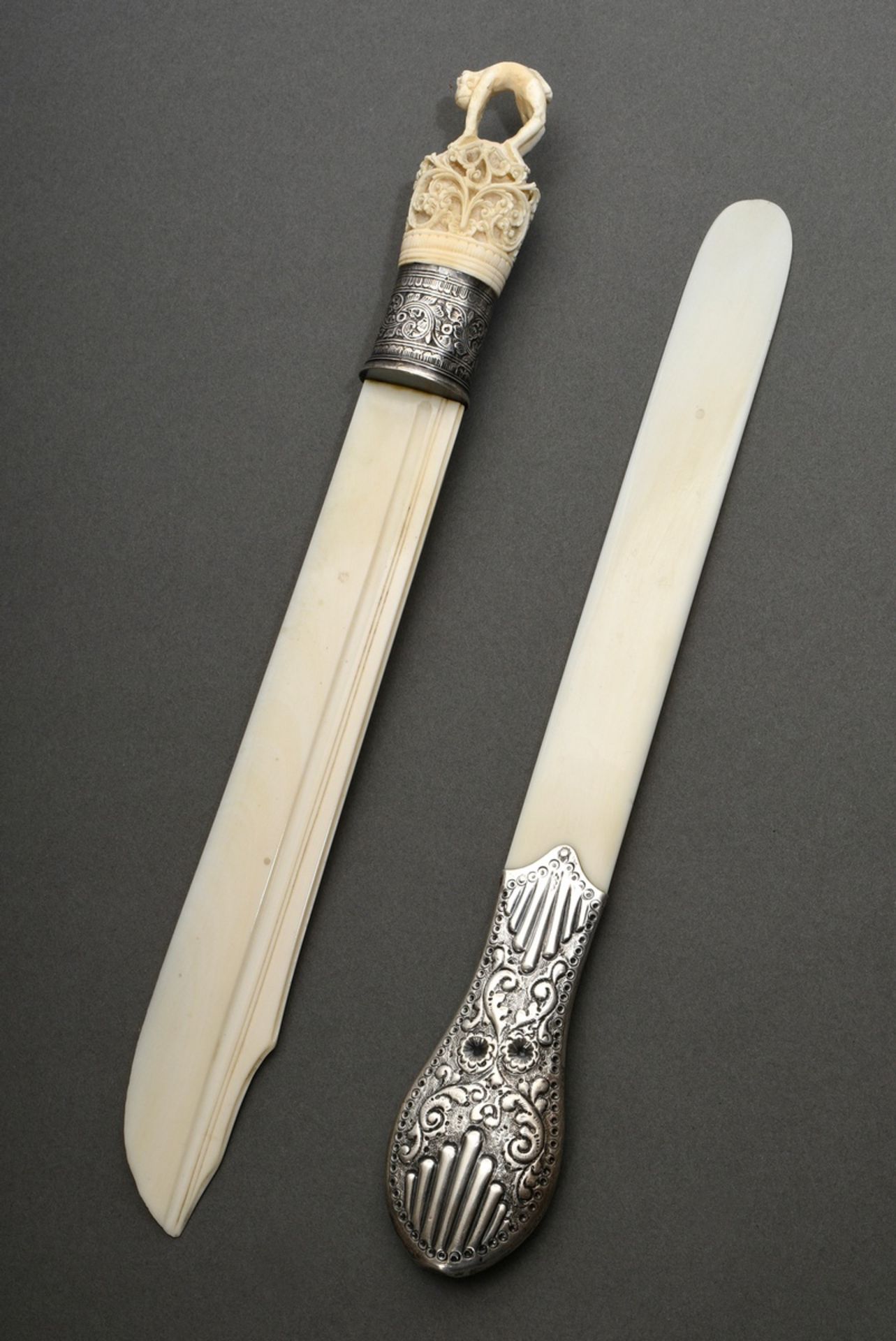 2 Various ivory letter openers, c. 1900: 1x with florally embossed silver handle (London 1890, l. 3