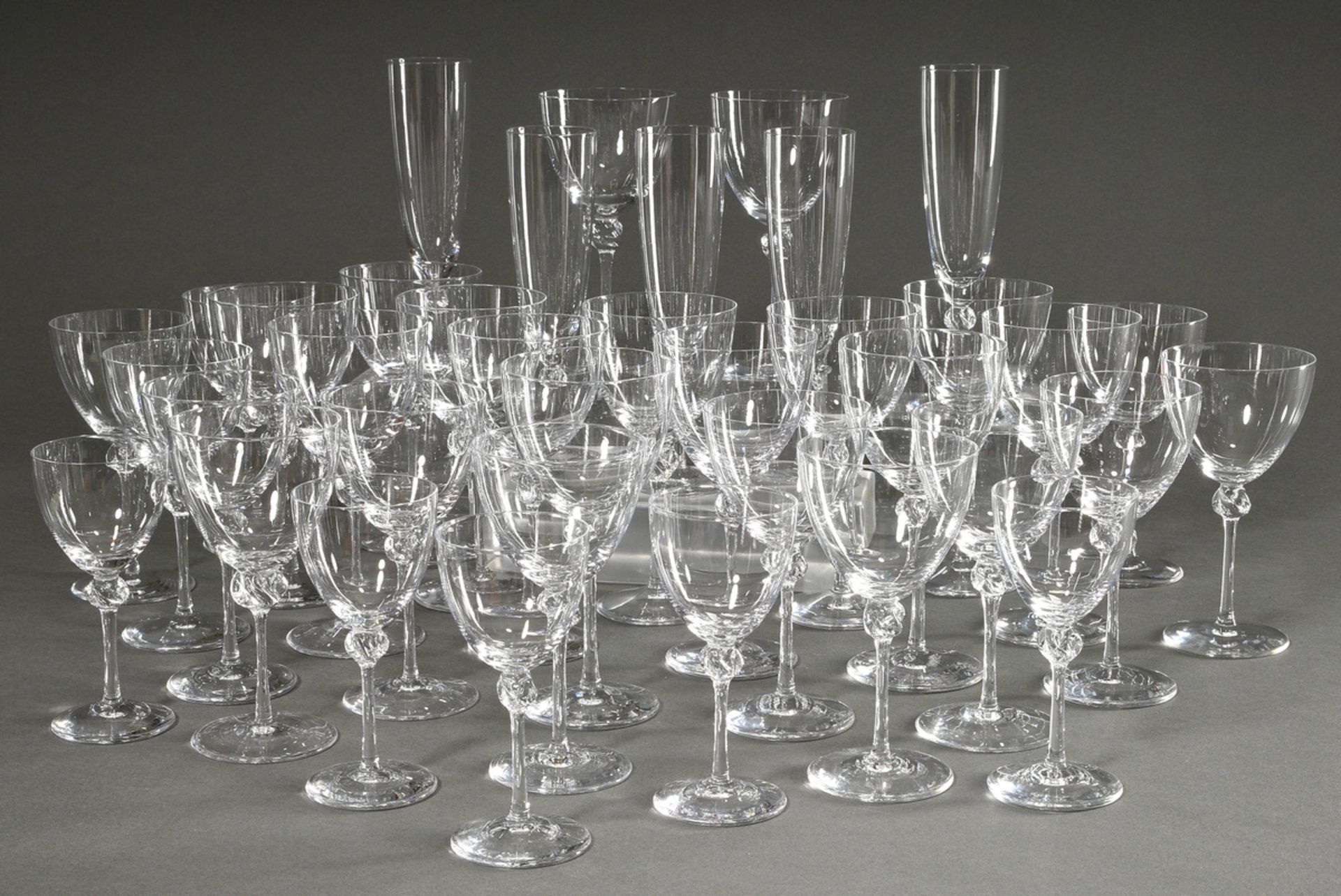36 Daum Nancy "Boléro" glasses with delicate domes and knots in the stem: 14 large wine glasses (h.