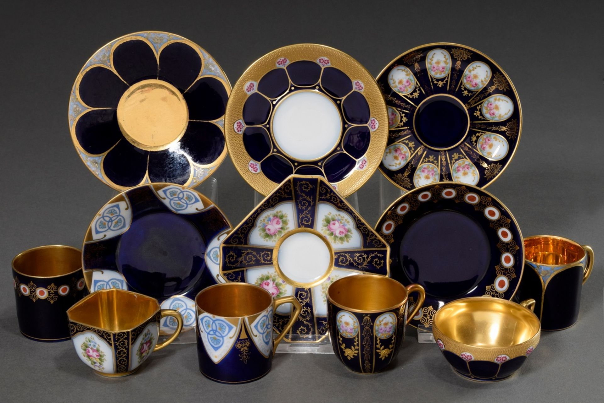 6 Various moch cups/saucers with different floral-ornamental gold decorations and polychrome painte