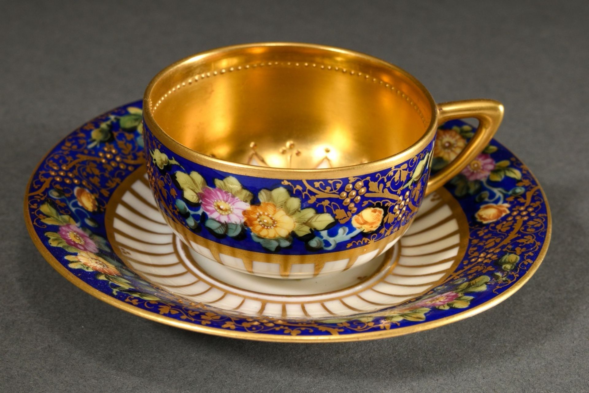 Magnificent demitasse cups/saucers with polychrome floral painting and pastose gold decoration on a - Image 2 of 5
