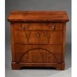 Small three-tier Biedermeier chest of drawers with segmental arch in the front, mahogany veneered o