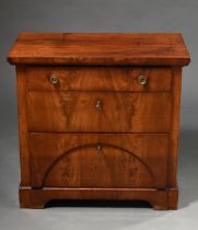 Small three-tier Biedermeier chest of drawers with segmental arch in the front, mahogany veneered o