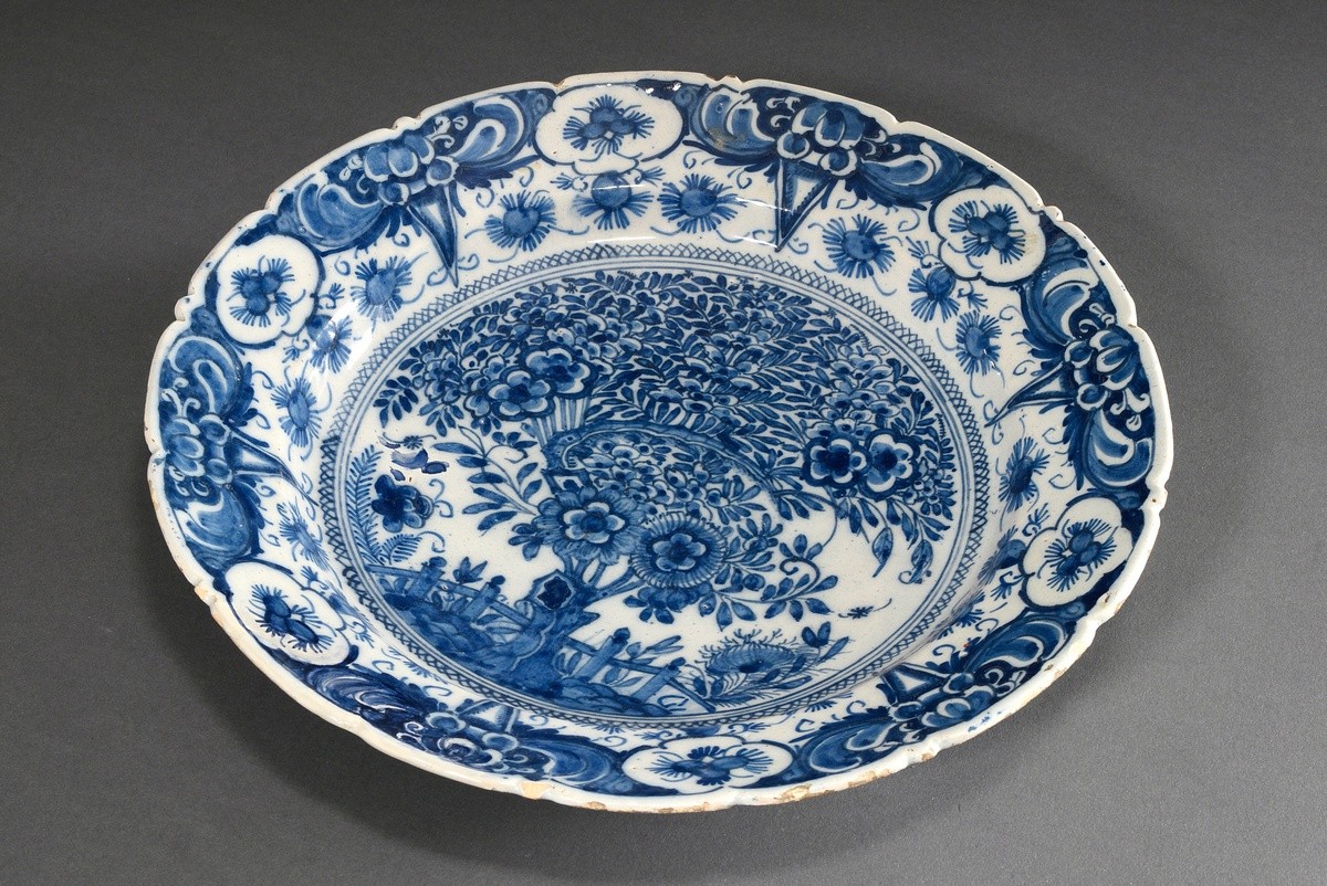 Faience plate with rich blue painting decoration ‘Garden with tulip tree’, verso marked ‘B:P’ for D