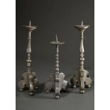 3 various baroque pewter candlesticks with baluster shaft over tripod and spike over protruding dri