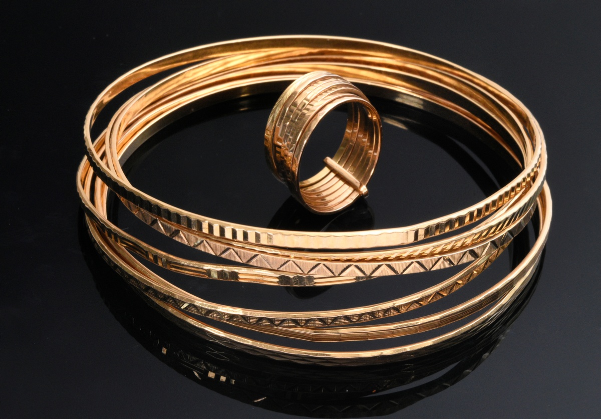 8 Various pieces of oriental yellow gold 750 jewelry: 7 bracelets with different patterns (Ø 6.8cm,