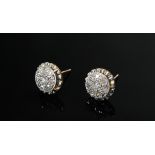 Pair of yellow and white gold 750 stud earrings with flower-shaped diamonds (total approx. 0.30ct/S