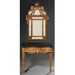 Two-piece opulent Louis XVI console with black marble top and matching mirror, c. 1760/1770, carved