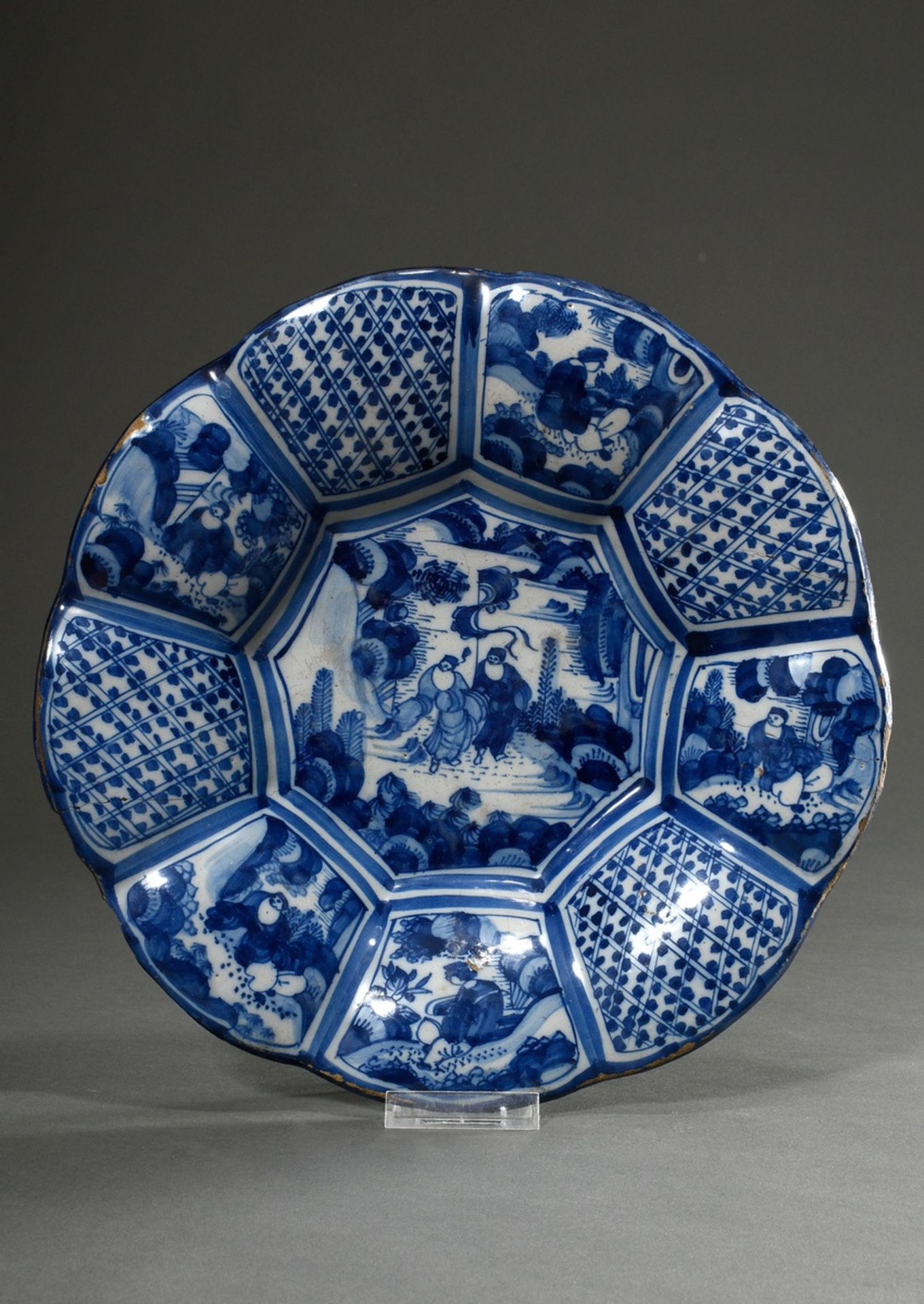 Faience humpback plate with chinoiserie decoration in blue painting, probably Frankfurt, 18th centu