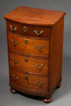 Small pier chest of drawers with 4 drawers and rounded front and vertically grooved top on pressed 