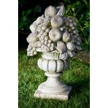 Decorative cast stone garden vase with sculptural fruit bouquet on a square pedestal, 20th century,