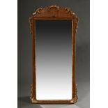 Small baroque console mirror with gilded carved decorations on mahogany and ornamented tie, old gla