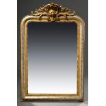 French fireplace mirror with silvered and gilded frame in simple form with central ornamental decor