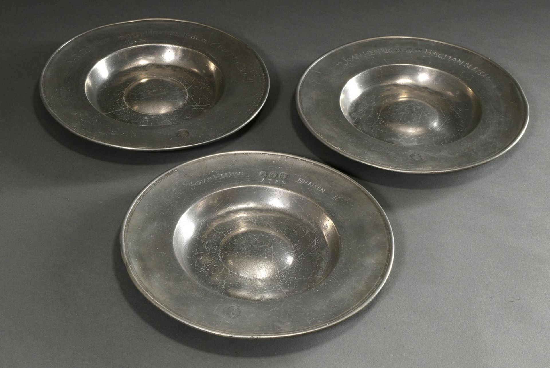 3 pewter wide rim plates with a humped centre, each dated and marked on the rim "A.R.D. Anthon Melc - Image 2 of 8