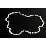 Long cultured pearl necklace on white gold 585 ruby clasp, l. 67cm, Ø 6.2mm